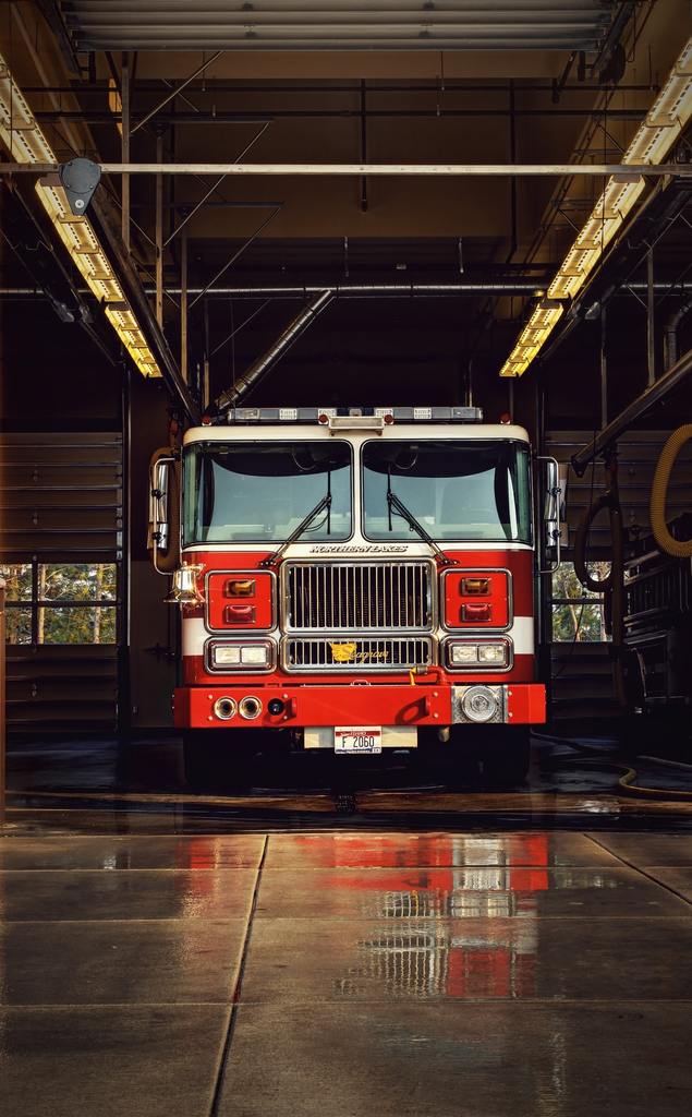 fire-truck-in-firehouse-for-fire-truck-maintenance-tips
